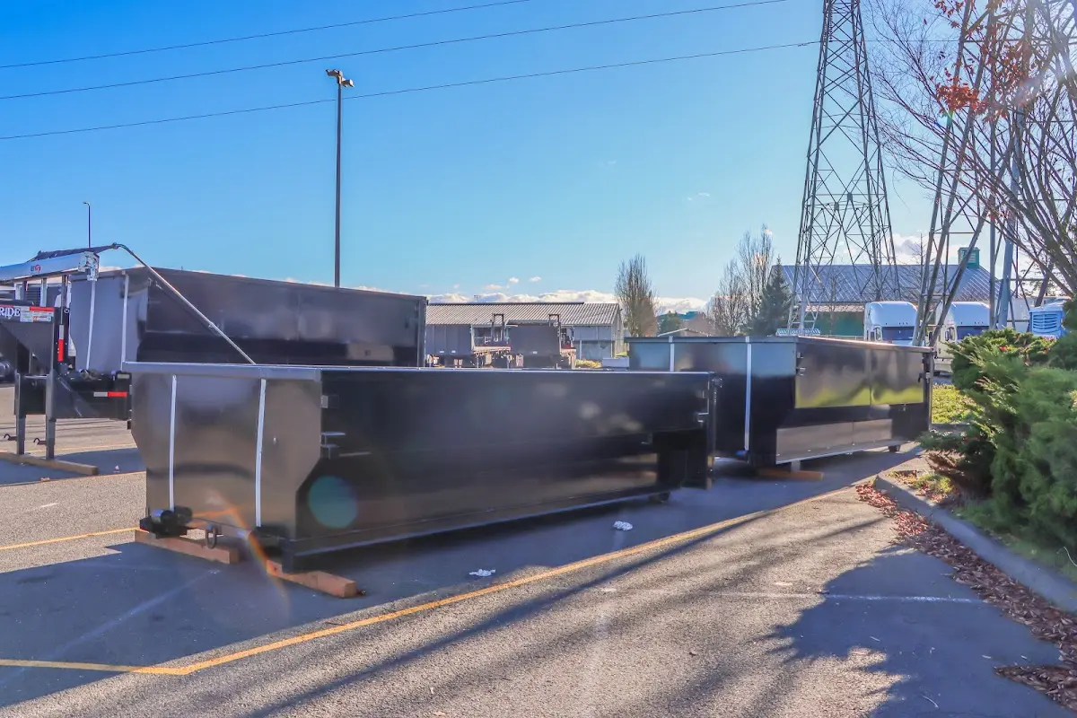 Roll-off dumpster ready for waste disposal at job site for 2 Yard Dumpster Rental in Burlington
